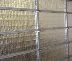 DIY garage door insulation kits are realtively inexpensive and are easy to install.