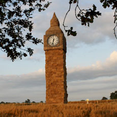 Big Ben, strawbale sculpture built by Snugburys ice-cream in the UK.