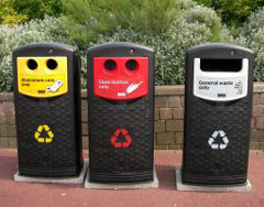 Brightly coloured recycling bins.